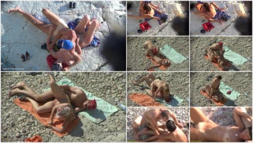 Sexy couple having sex on a beach